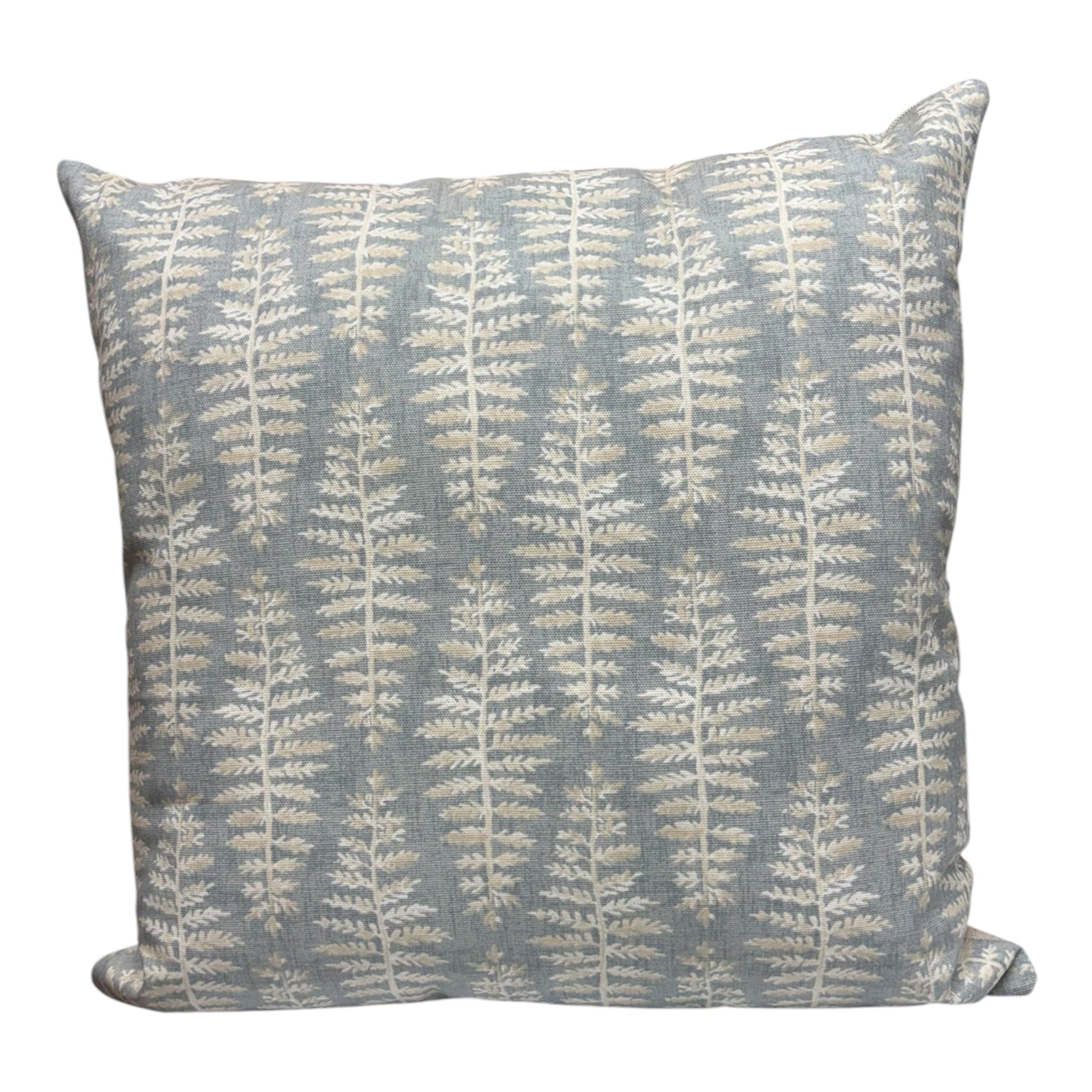 Handmade zipped cushion cover with a neutral coloured fern leaf pattern on a light blue background.  The cushion cover is complemented with neutral fabric on the reverse.