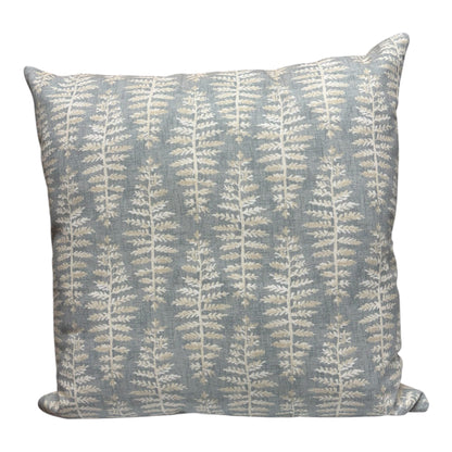 Handmade zipped cushion cover with a neutral coloured fern leaf pattern on a light blue background.  The cushion cover is complemented with neutral fabric on the reverse.