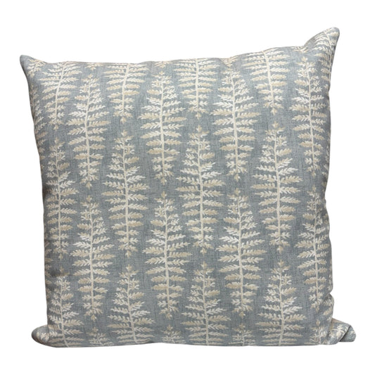 Handmade zipped cushion cover with a neutral coloured fern leaf pattern on a light blue background.  The cushion cover is complemented with neutral fabric on the reverse.
