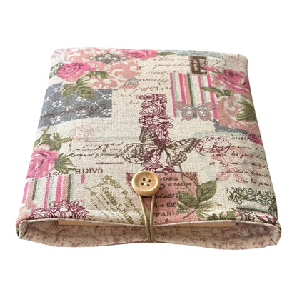 The padded Book Cover has elastic and button fastening which protects the book from slipping out of the Book Pouch.  Please note the book is not included and is for illustrative purposes only.