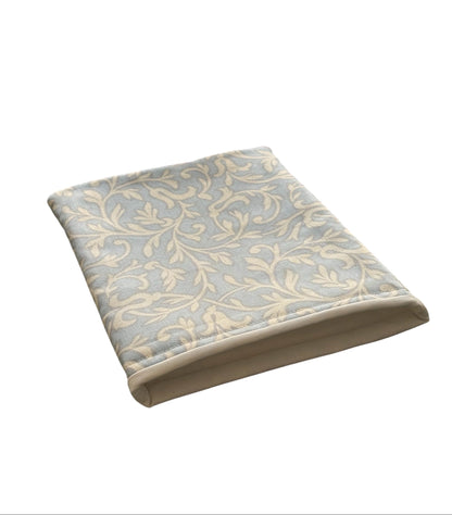The handmade Book Pouch is approximately 21.5cms x 17cms (8 1/4inches x 6 3/4inches) and would also offer protection for a Kindle or e-Reader but check the measurements of the device prior to placing an order.