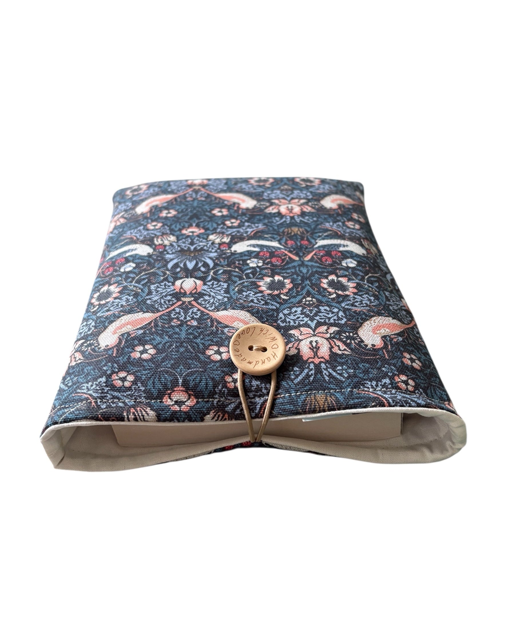 The Book Pouch will protect precious books from wear and tear whilst being carried on the go and would make an ideal Book Lovers Gift.  Please note the book in the photo is not included and is for illustrative purposes only.