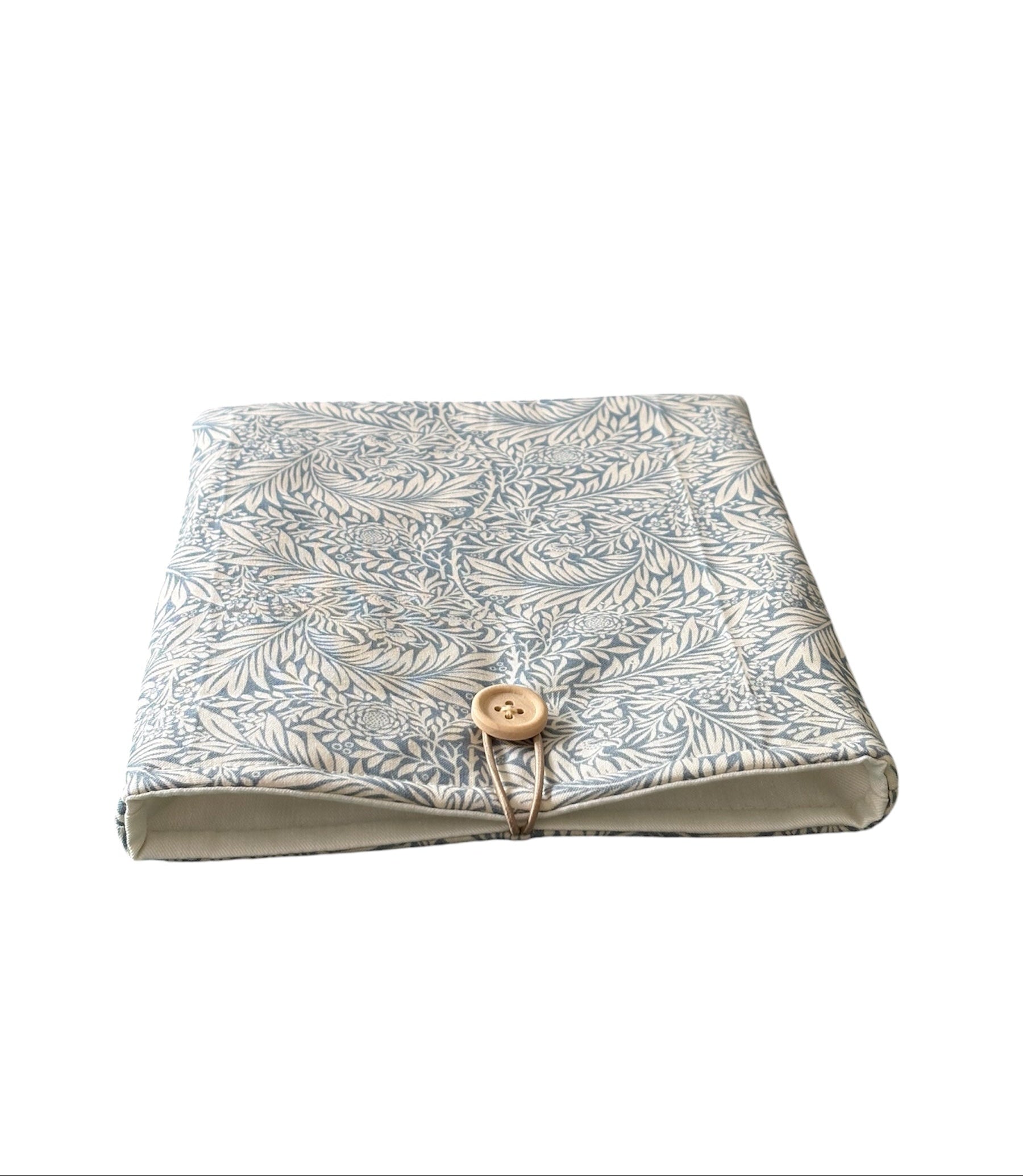 The handmade Book Pouch is approximately 23.5cms x 18.5cms and as well as offering protection for books could also protect Kindle e-Readers from being scratched whilst being carried on a bag.  However, please check the measurement of the device prior to placing an order.