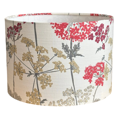 The handmade drum lampshade is 30cms diameter and the height is 21cms.  The shade is for a lamp base only and is not suitable for a ceiling fitting due to the pattern direction.