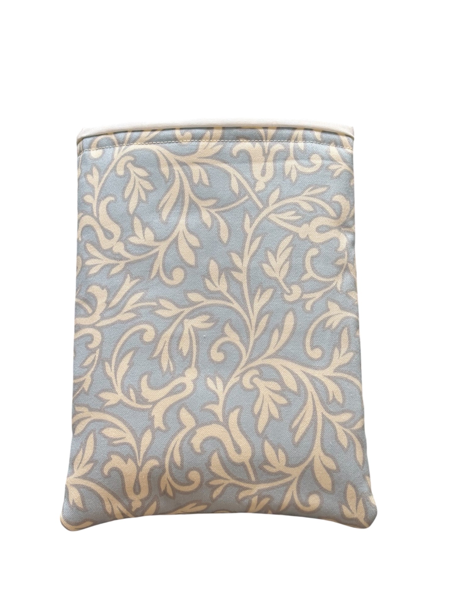 Handmade padded Book Pouch made with pale blue fabric which has a vine leaf style pattern.  The handmade Book Pouch is lined with neutral fabric and padded with fusible wadding.