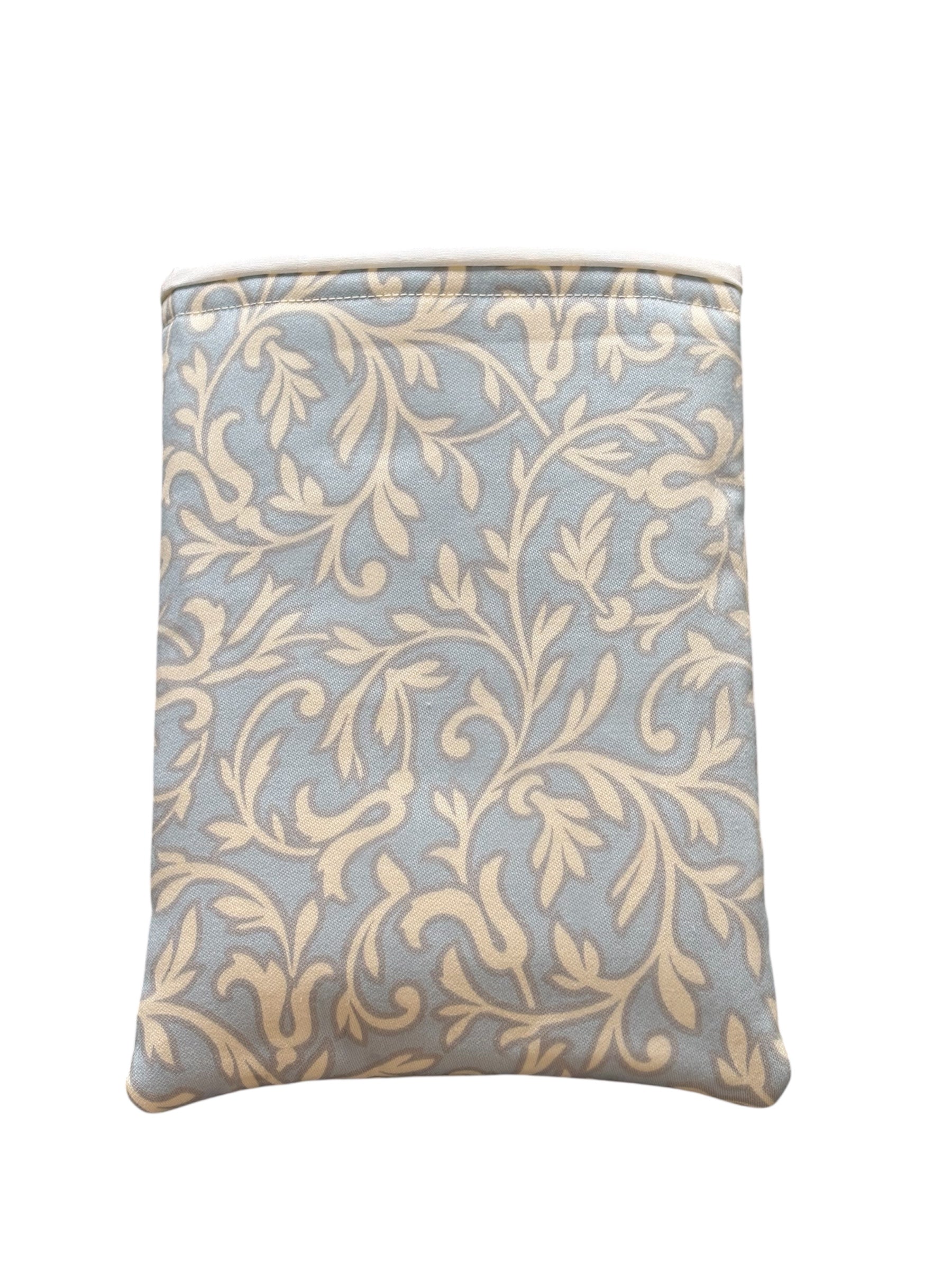 Handmade padded Book Pouch made with pale blue fabric which has a vine leaf style pattern.  The handmade Book Pouch is lined with neutral fabric and padded with fusible wadding.