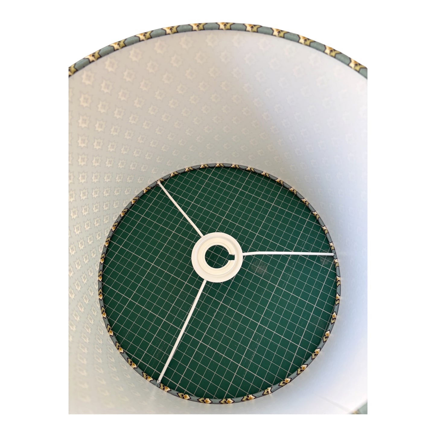 Another close up from the top of the handmade shade looking down to the fitting, which also shows the hand rolling of the drum lampshade.