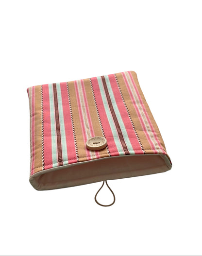 The Book Pouch has been made with multicolour striped fabric and this is on the front, as shown, and also on the reverse of the Book Cover.  The handmade Book Pouch in lined with complementing neutral fabric, padded with fusible wadding and has elastic and button fastening.