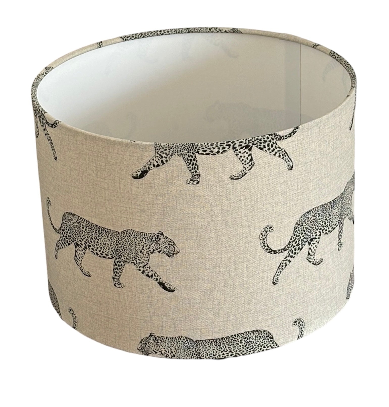 The drum lampshade is 30cm diameter and 21cms high and is suitable for a lamp base only and not suitable for a ceiling fitting due to the direction of the pattern.