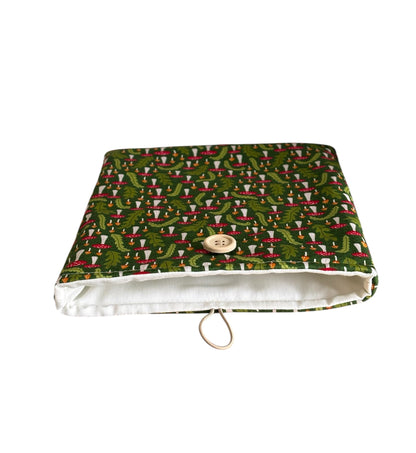 The handmade Book/Kindle Cover is padded with fusible wadding, lined with neutral fabric and has elastic and button fastening.