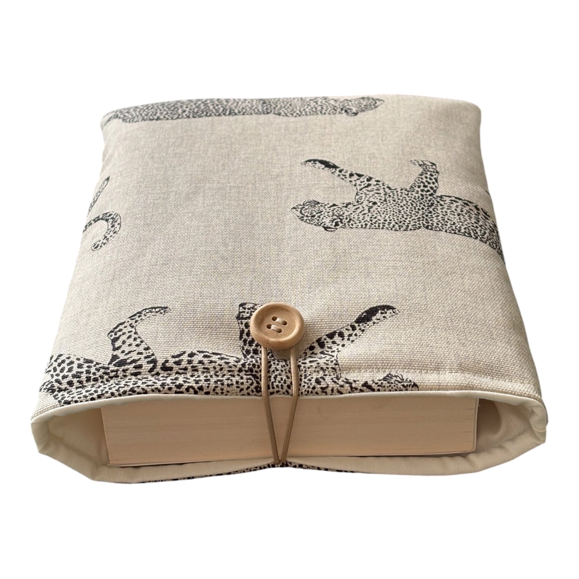 Please note the book in the photo is not included and is for illustrative purposes only.  The padded Book Pouch would also offer protection for a Kindle or other reading device but please check the measurements of the device prior to placing an order.