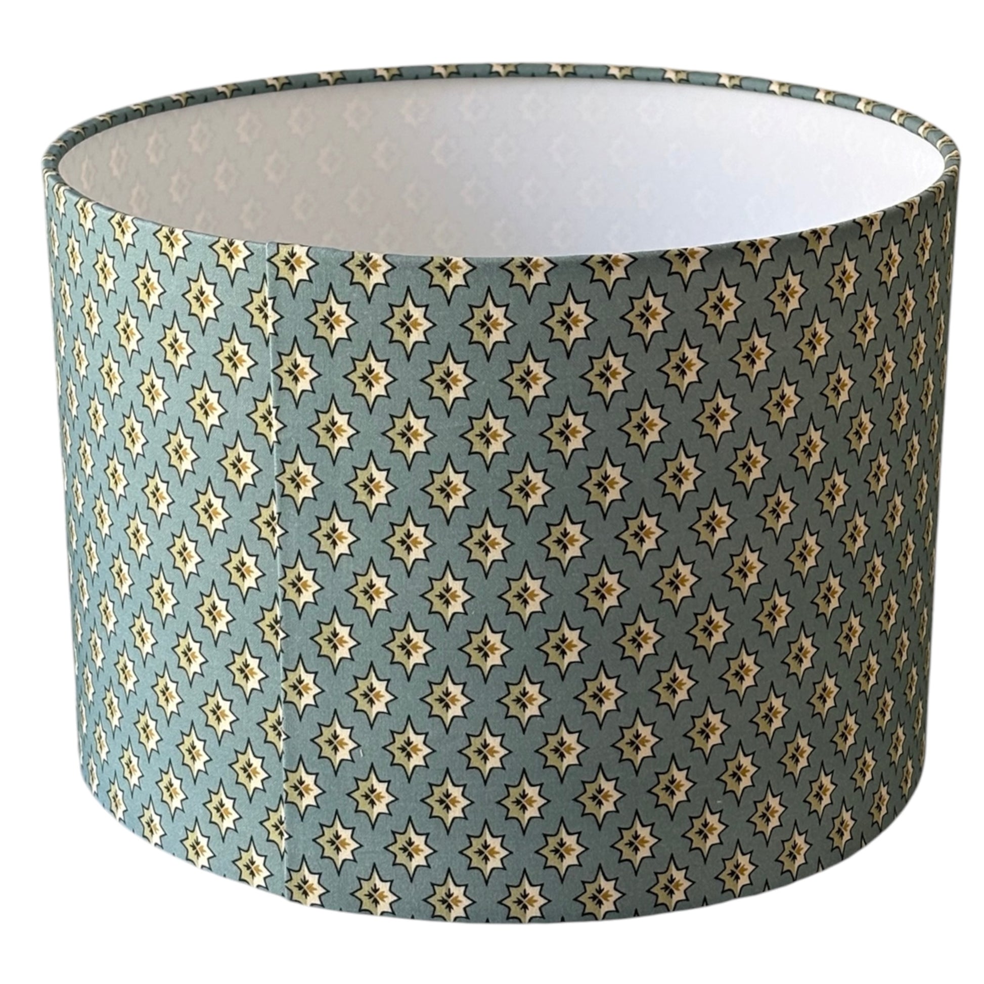 This photo shows the join and the pattern may not always match due to pattern repeat.  The handmade drum lampshade is 30cms diameter and 21cms in height.