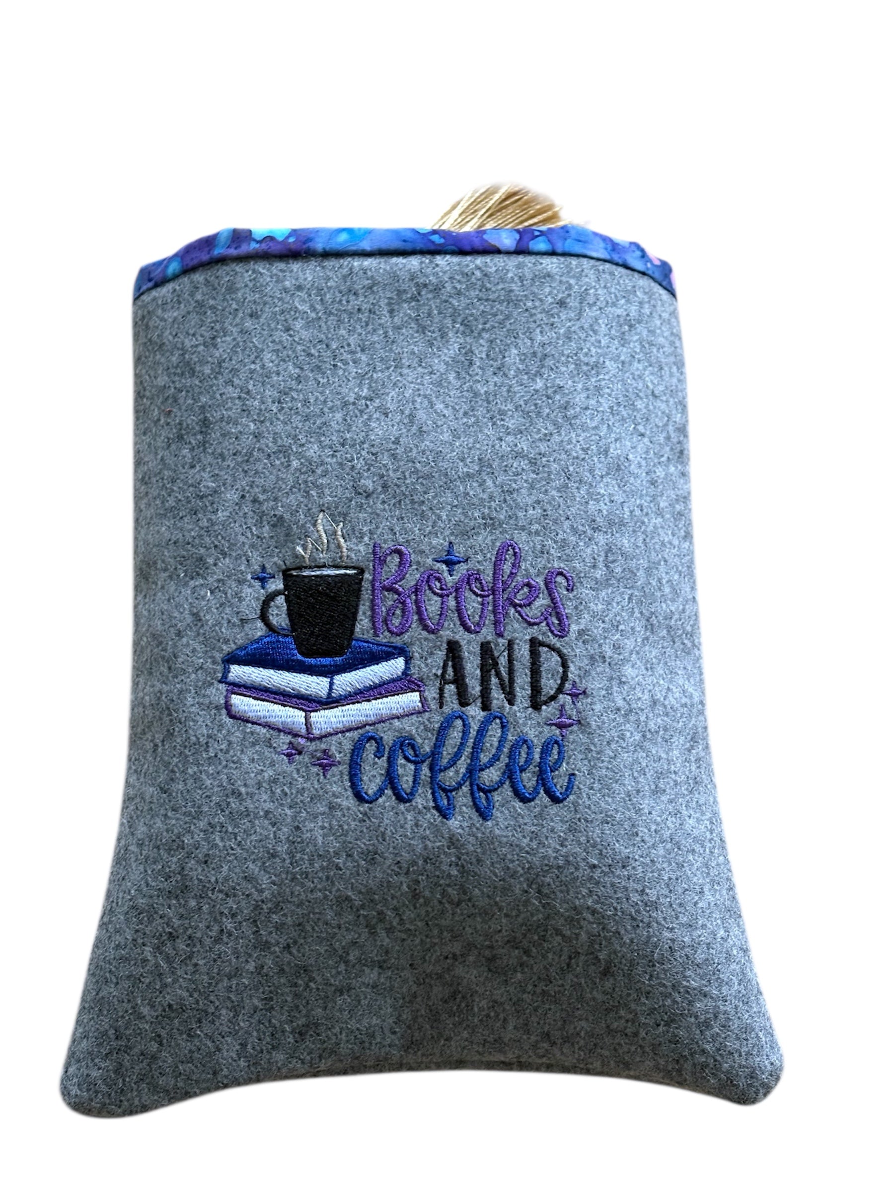 A photo of the Book Pouch with two books and part of the bookmark can be seen.  Please note none of the items indicated in the photo are included and the listing is for the handmade padded embroidered Book Pouch.