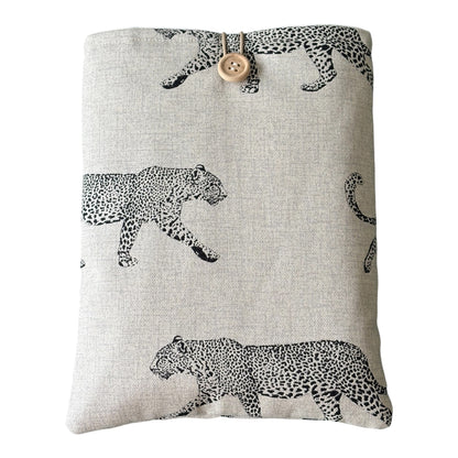 Handmade padded Book Pouch made with leopard pattern on linen look fabric.  The handmade Book Cover is approximately 24cms x 18.5cms and would be an ideal book accessory as a Book Lovers Gift.