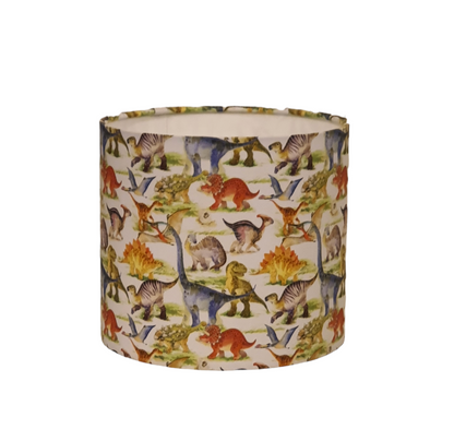 Handmade 20cm drum lampshade made with Lost World Dinosaur fabric.  A lovely gift for someone who loves Dinosaurs.