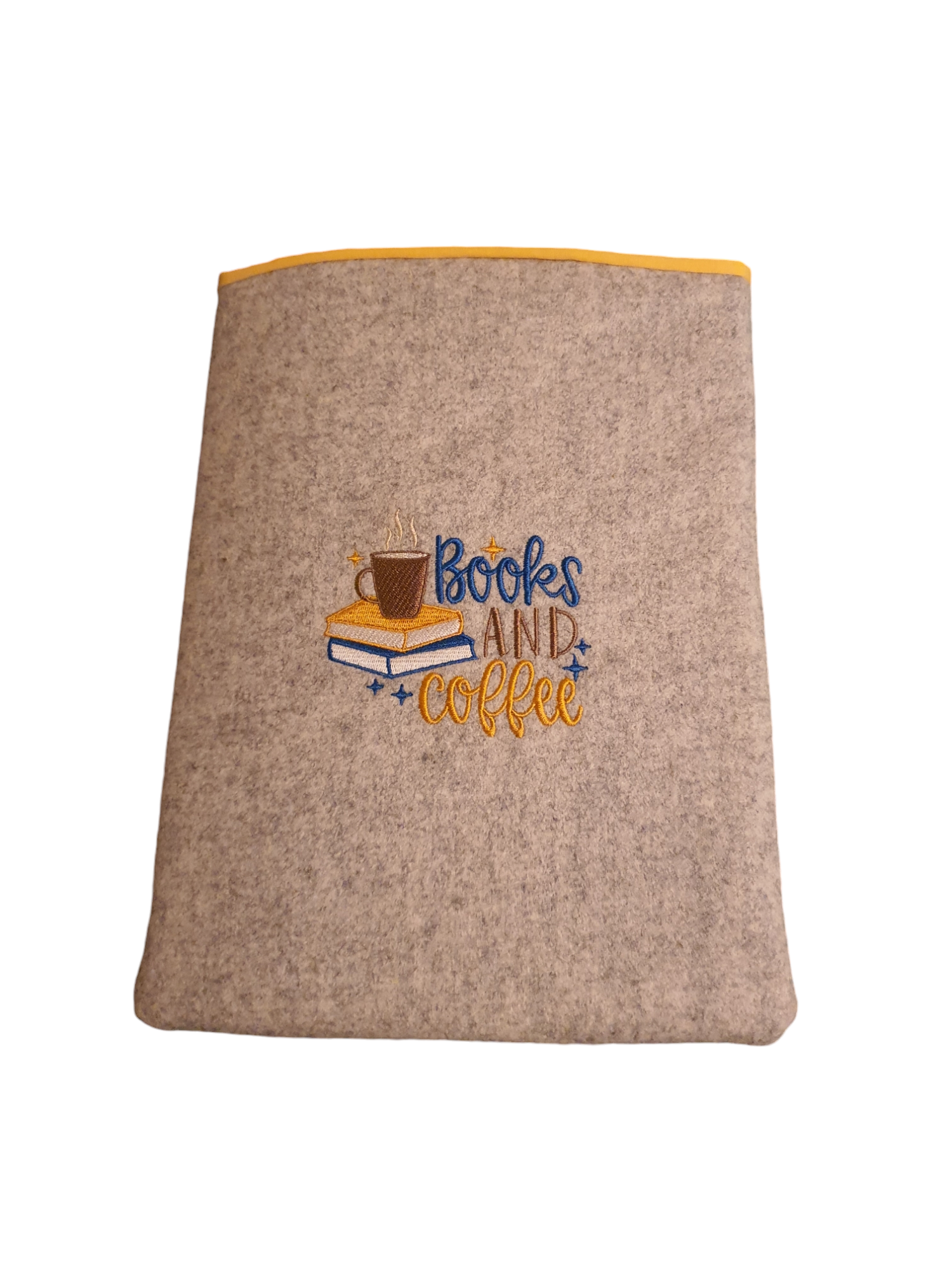 Handmade padded Book Pouch with a Books and Coffee embroidered pattern on the front of the Book Sleeve.  Will protect your books, Kindle, Tablet or e-Reader and would be a great Book Lovers Gift.