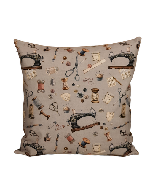 Handmade zipped cushion cover made with Vintage Kit fabric.  The cushion cover has a patterned front and is complemented with neutral fabric on the reverse and fastens with an enclosed zip.